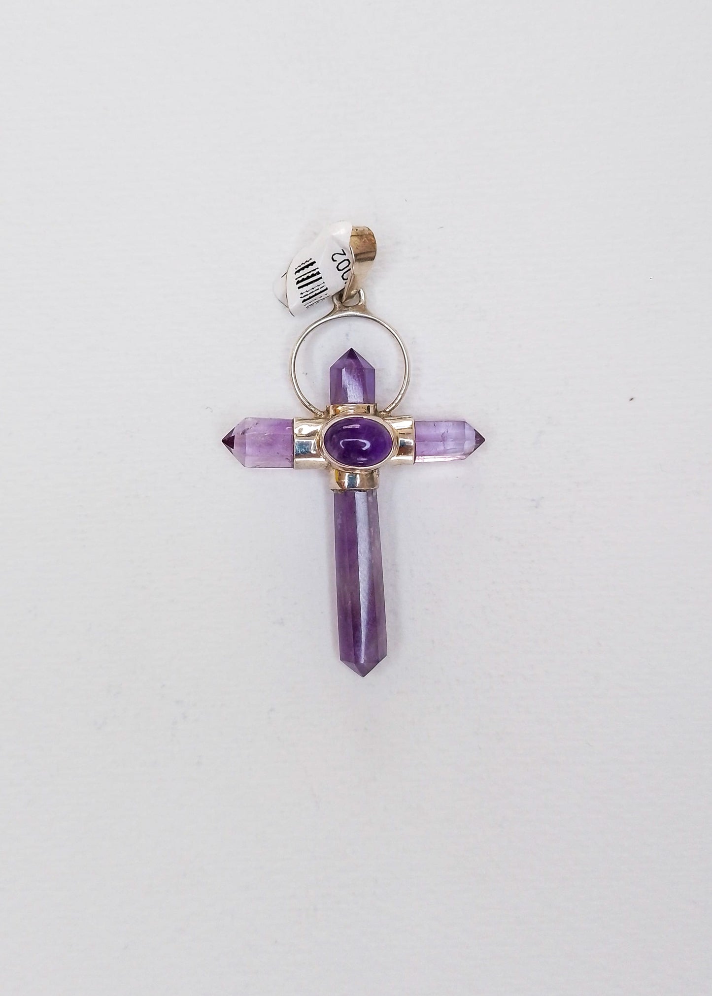 Silver cross with amethyst