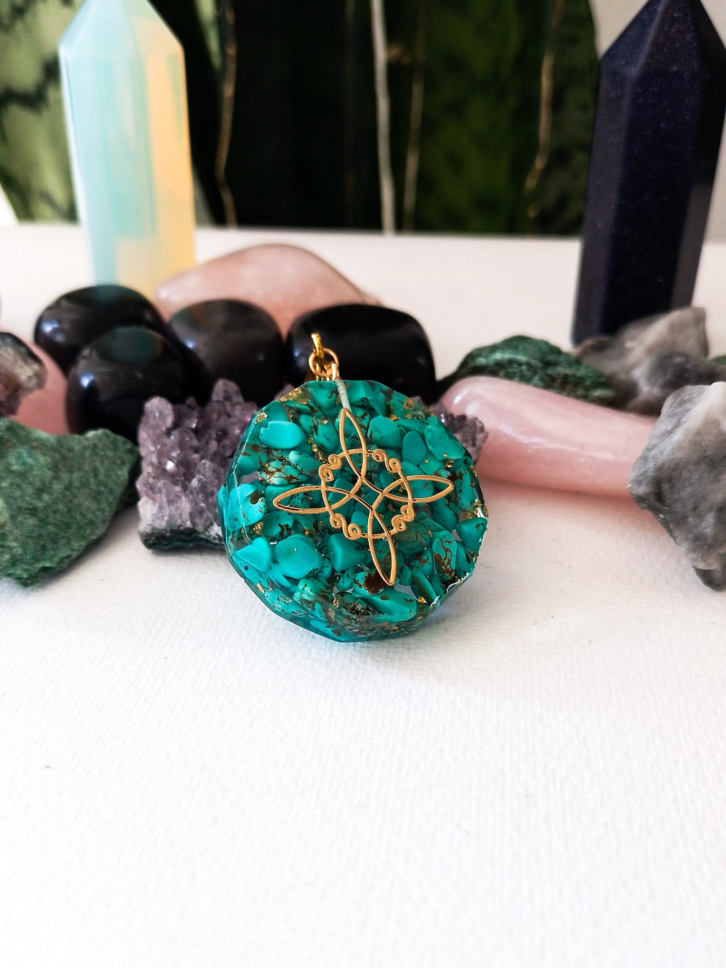 Resin orgonite with turquoise and witch's knot