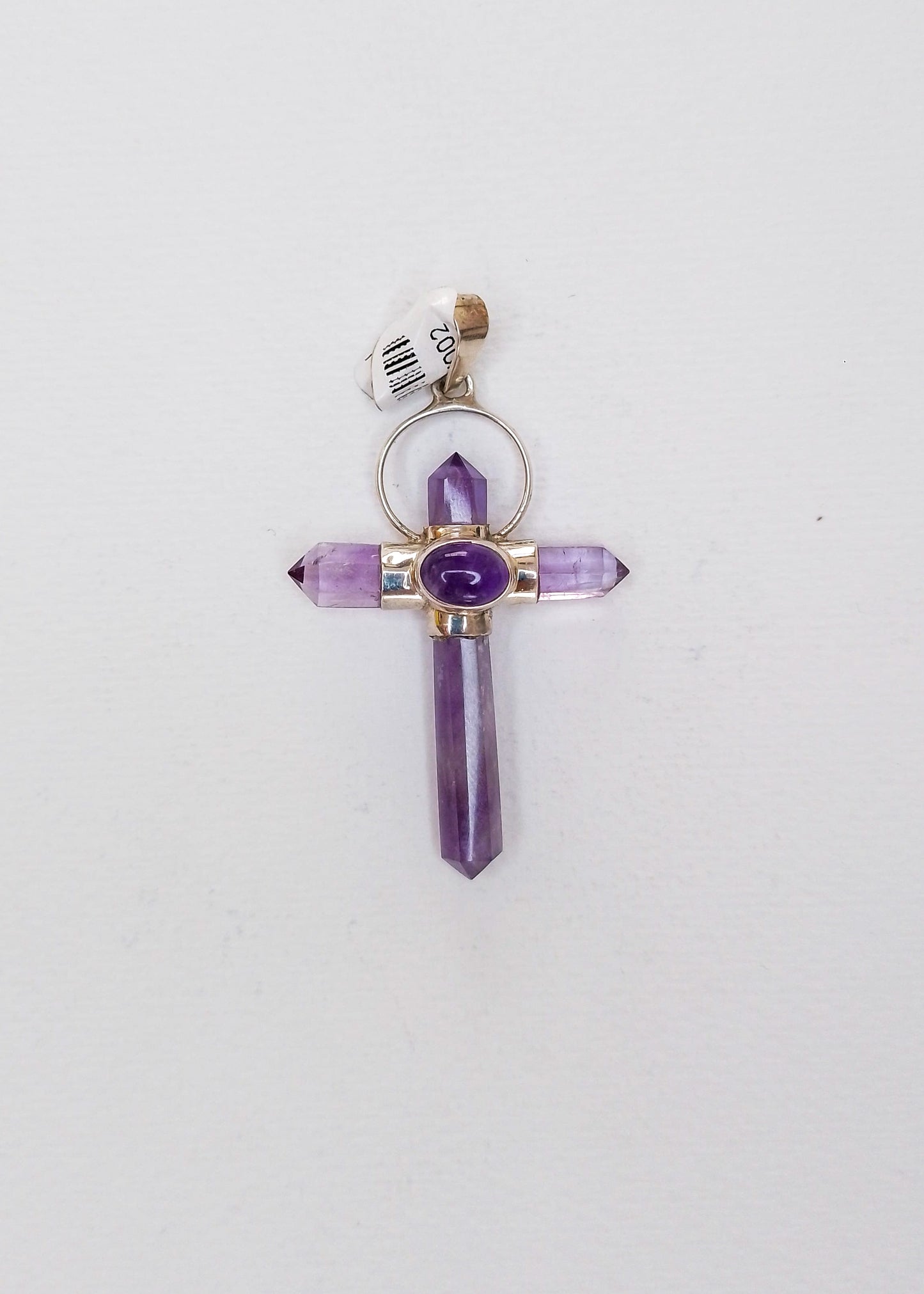 Silver cross with amethyst