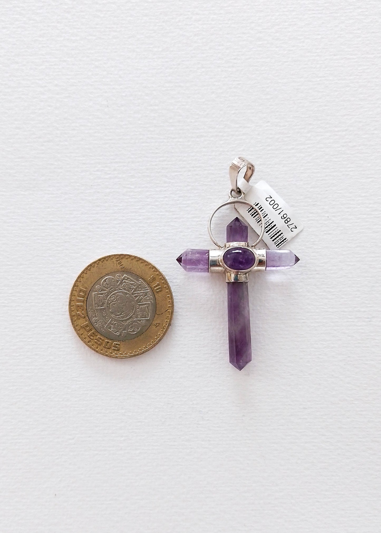 Silver cross with amethyst